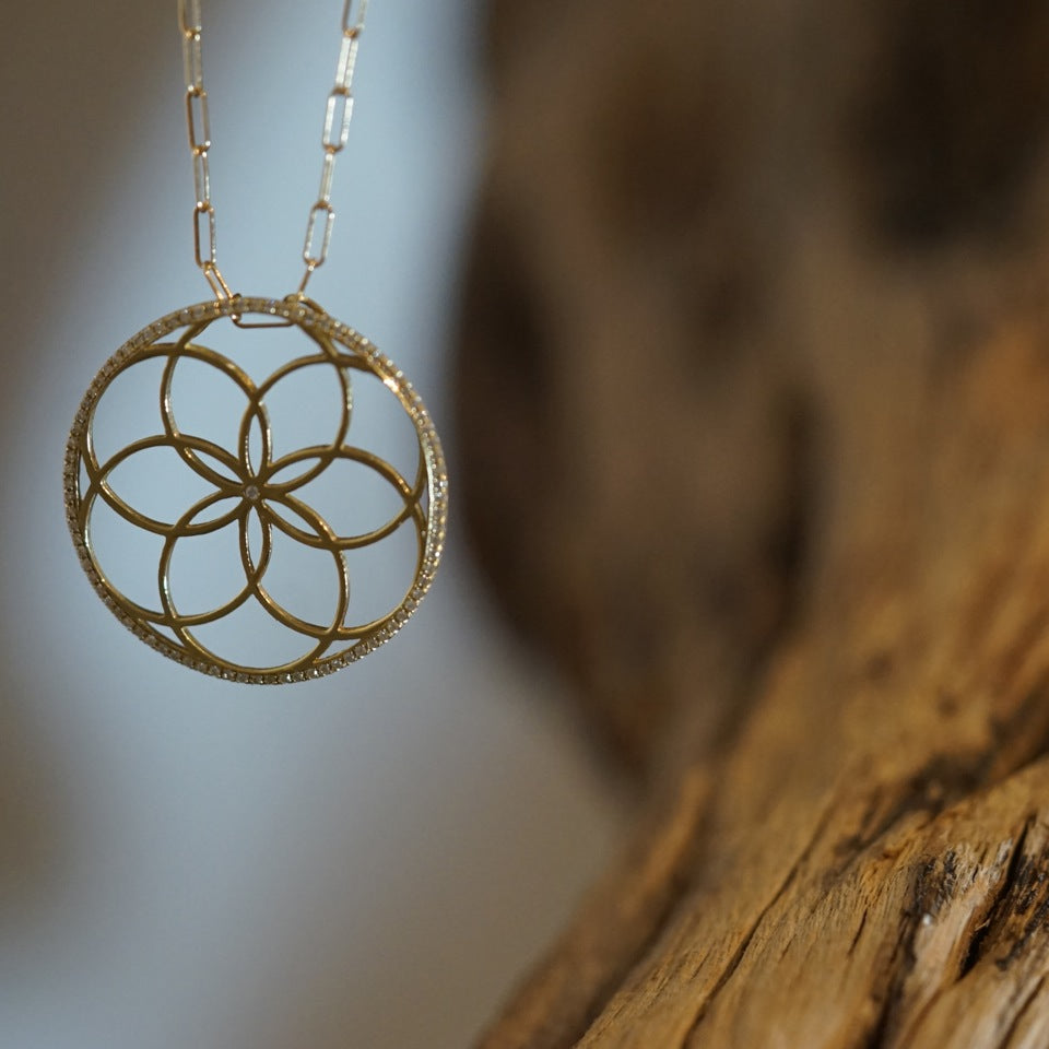 
                  
                    Sacred Flower Necklace
                  
                